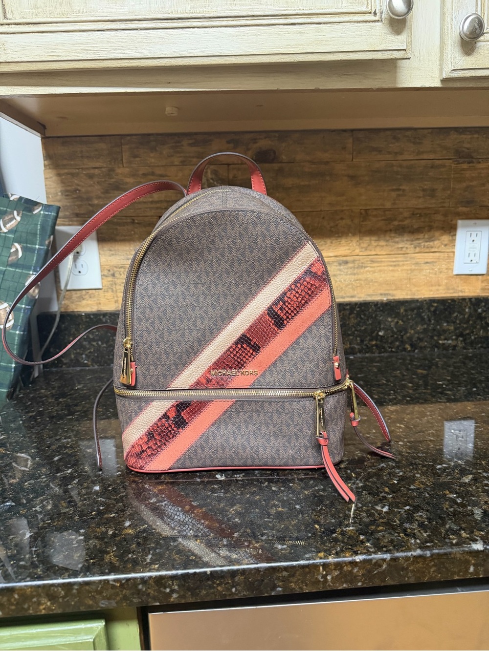 Michael Kors Brown Backpack with Coral Stripe Accents
